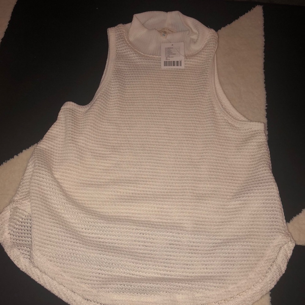 sleeveless turtleneck top